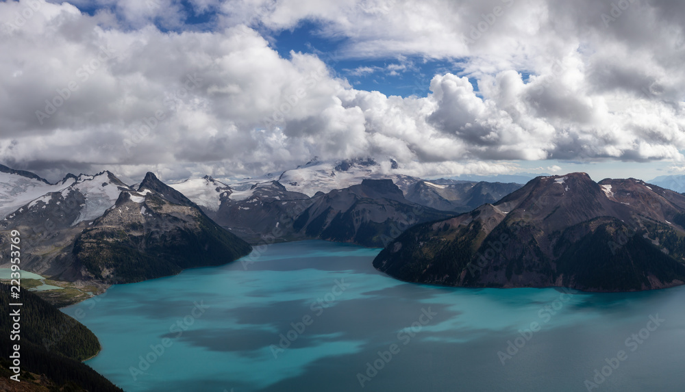 Beautiful panoramic landscape view of Garibaldi Lake vibrant sunny summer day. Taken from top of Panorama Ridge, located near Whister and Squamish, North of Vancouver, BC, Canada.