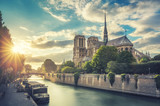 Notre Dame de Paris, France, and the Seine river at sunset. Scenic travel background.