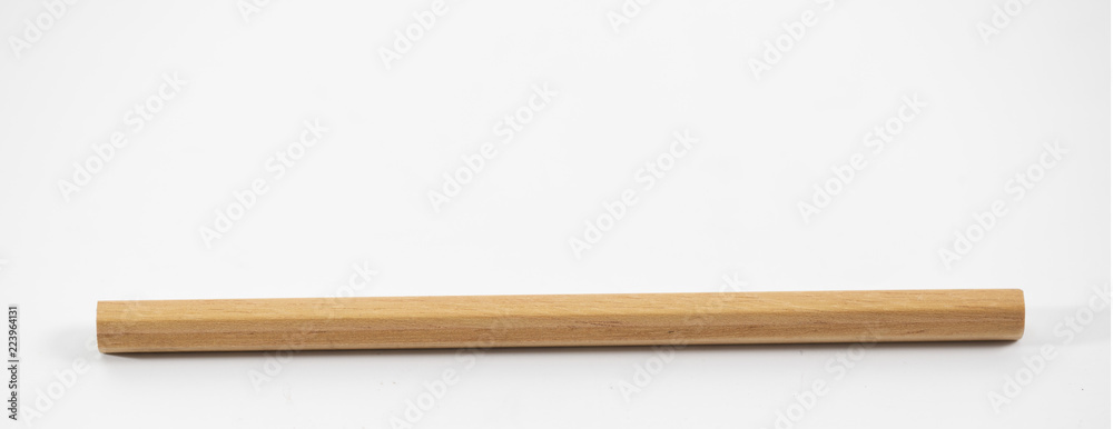 brown pencil on the white background brown pencil on the white background