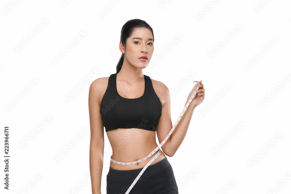 Growth portrait of fitness woman in sportswear. Growth portrait of fitness woman in sportswear.