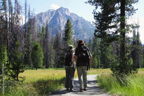 Two hikers in the rocky mountains 