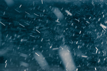 Snowflakes against black background for adding falling snow texture into your project. Add this picture as "Screen" mode layer in Photoshop to add falling snow to any image.