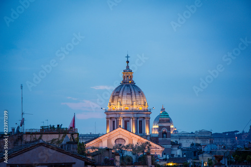 Blue hour view of the Basilica of Saints Ambrose and Charles the Corso, Rome