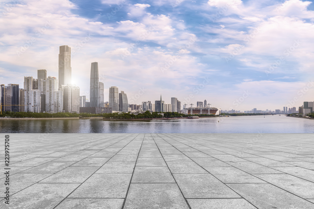 Urban skyscrapers with empty square floor tiles