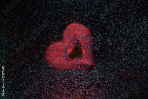 Photography Broken heart and love.Broken glass in the background