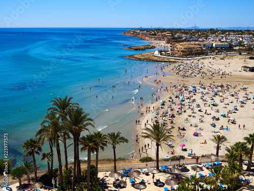 Popular summer travel destination La Zenia Beach Orihuela Costa Spain photo