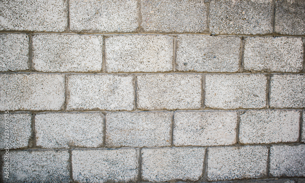 brick slag-block wall fence for construction design architecture wallpaper  Stock Photo | Adobe Stock