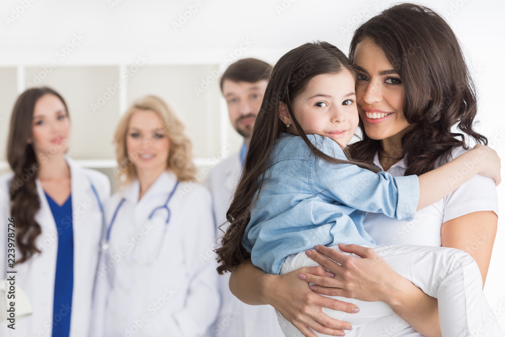 Mother and daughter in medical clinic Mother and daughter in medical clinic