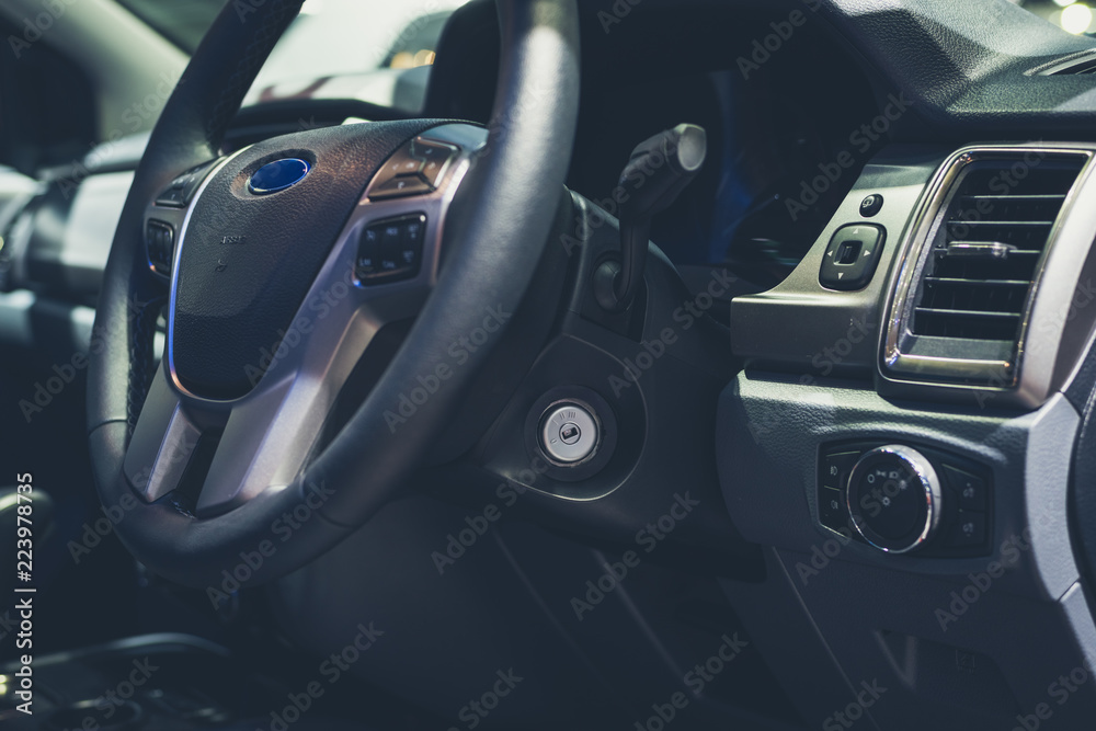 interior of a modern car with steering wheel tone Luxury