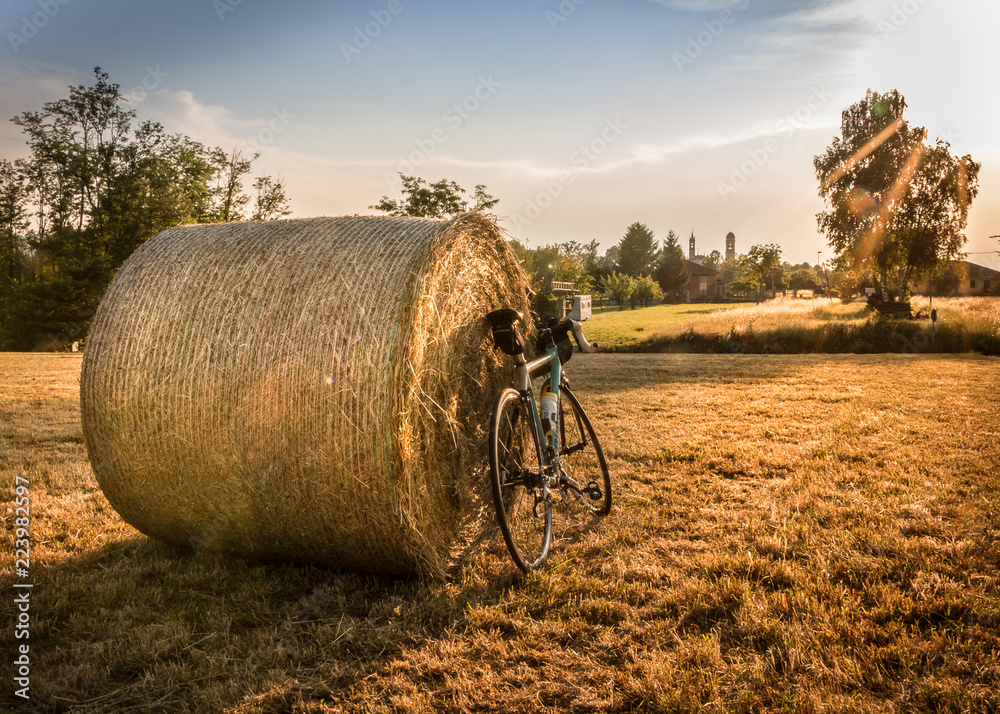 Bicycle in the countryside of Italy cycling at sunset 