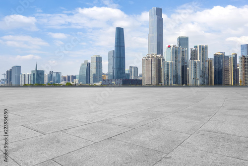 Urban skyscrapers with empty square floor tiles