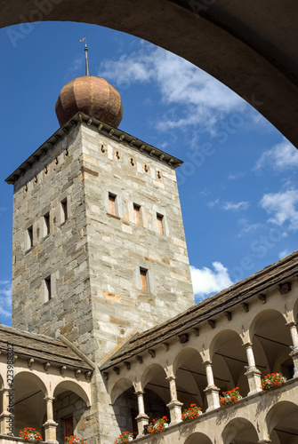 Looking at the tower of the beautiful Stockalper Palace that is located in the city of Brig in the canton of Valais, Switzerland. photo