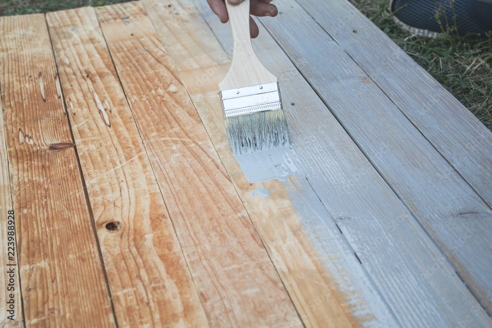 paint old wooden background with gray brush paint old wooden background with gray brush