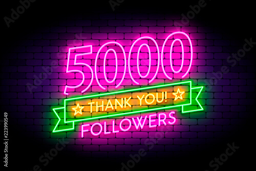 5000, 5K followers neon sign on the wall. 