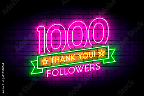 1000 followers neon sign on the wall. photo