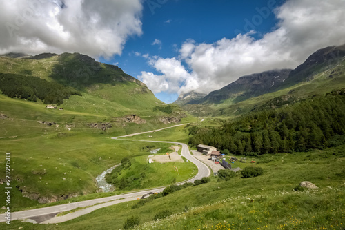Wide angle view towards the Julier Pass near Bivio (Graubunden, Switzerland). It is a mountain pass in the Albula Range of the Alps that connects the Engadin valley with the rest of Graubunden. photo