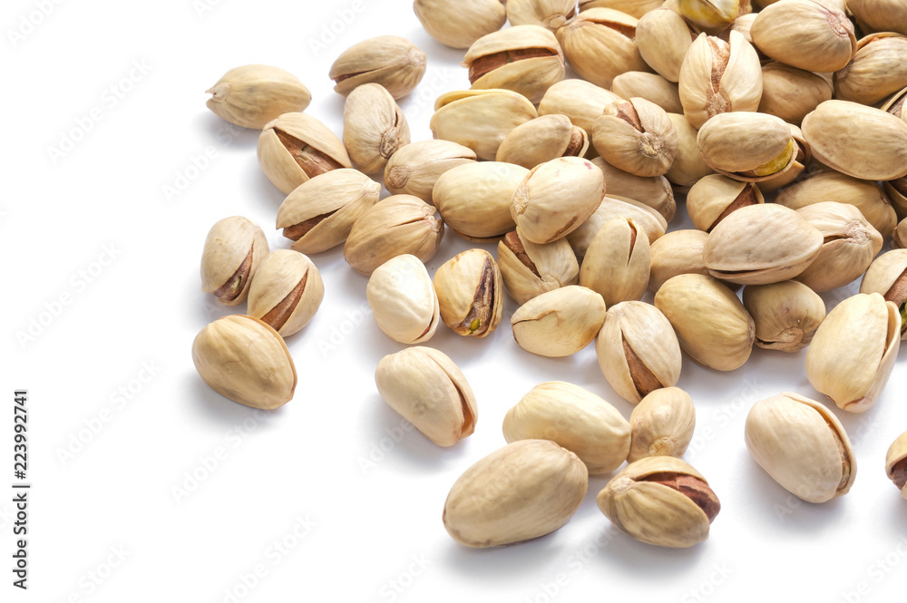 bunch of pistachios isolated on white