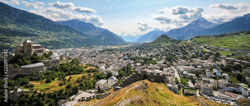 Panorama over Sion, the capital of the Canton Valais in Switzerland. Photo was taken on the hills surrounding Sion on which two castles are located: the Tourbilllon.and Valere. photo