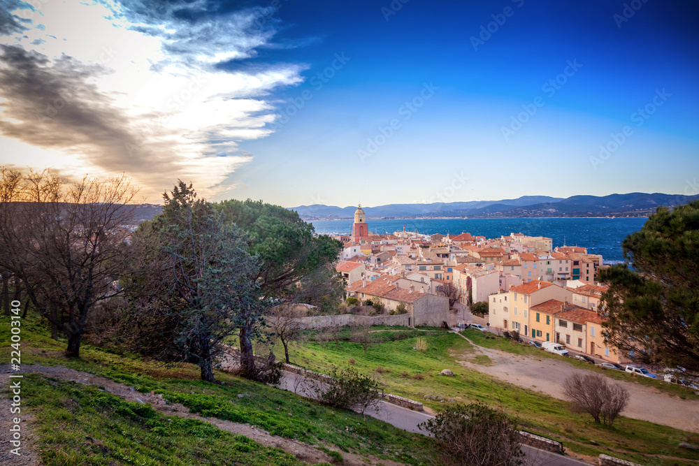 View of the old town with tiled roofs and the Gulf of Saint Tropez, beautiful scenery, a trip to the French Riviera in Provence in France