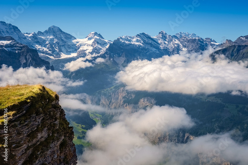 View from Mannlichen at the Bernese Alps  Berner Oberland  Switzerland . It is a mountain  2 343 metre  reachable from Wengen with a aerial cableway or from Grindelwald using a gondola cableway.