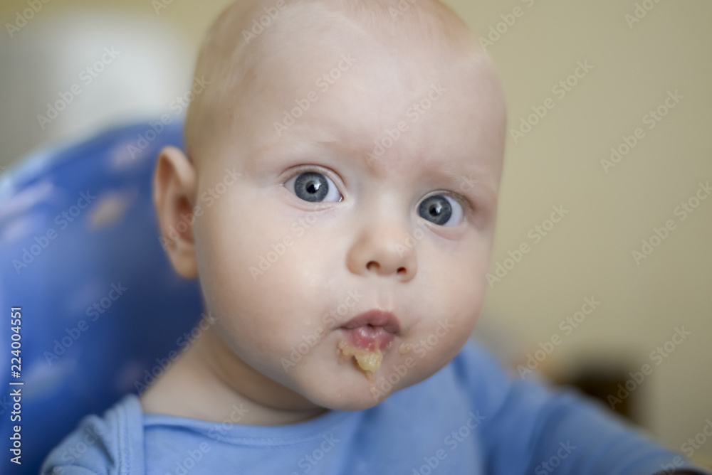 Portrait of a funny child smeared with applesauce Portrait of a funny child smeared with applesauce
