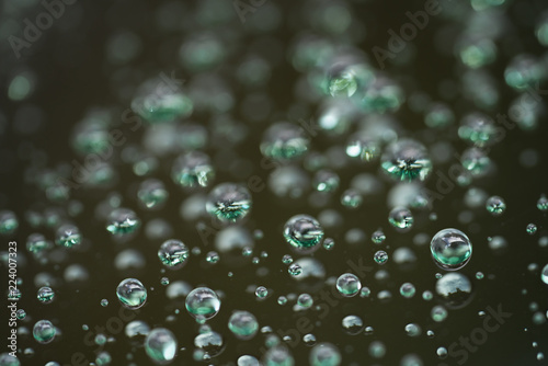 Картината върху платно Closeup rain drops on glass with hydrophobic coating