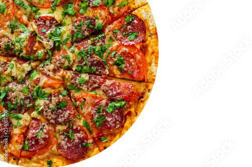 sliced Pepperoni Pizza with Mozzarella cheese, salami, Tomatoes, pepper, Spices and Fresh Basil. Italian pizza isolated on white background. with copy space. top view
