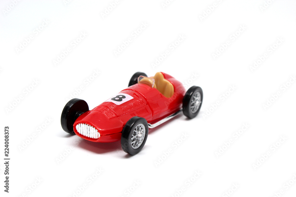 red toy car isolated on white background