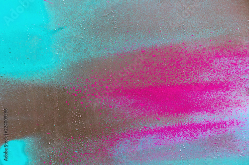 Wall Mural Colorful spray paint splatters on the wall