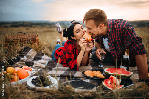 Love couple leisure together, picnic on the meadow
