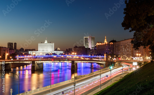 House of the government of the Russian Federation  beautiful Moscow river  night road and water traffic along the river and the embankment