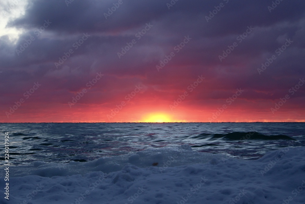 Obraz premium Sunset Over Frozen Sea