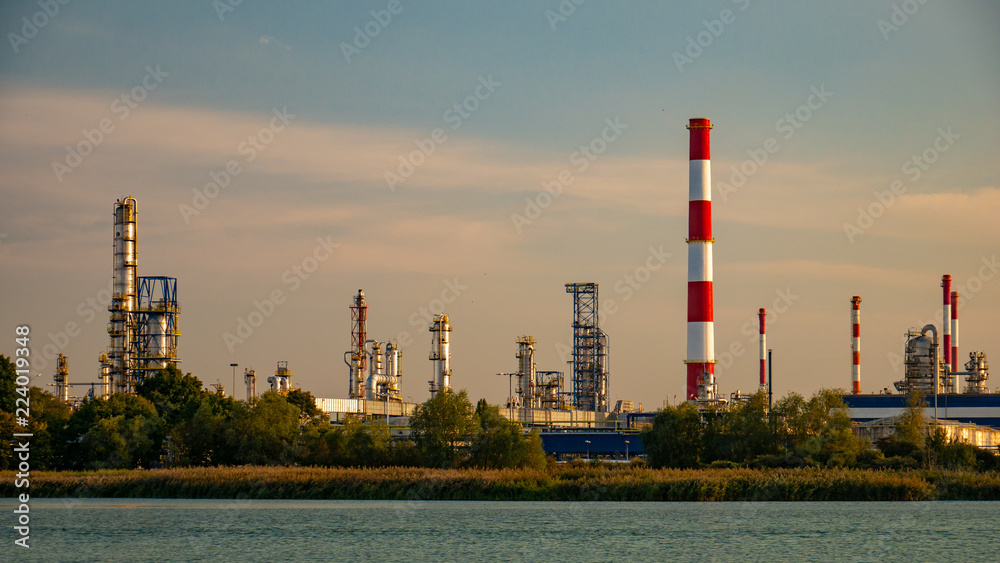 River and oil refinery factory in Gdansk, Poland. River and oil refinery factory in Gdansk, Poland.