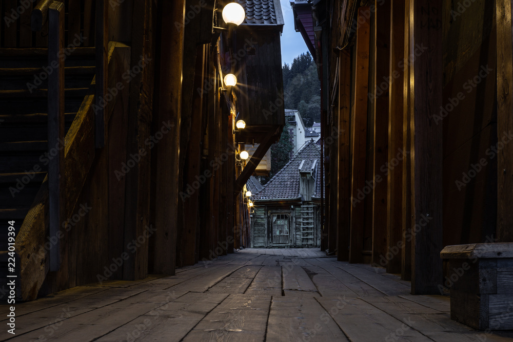 Empty old medieval alleys in Bryggen in Bergen in Norway early in the morning