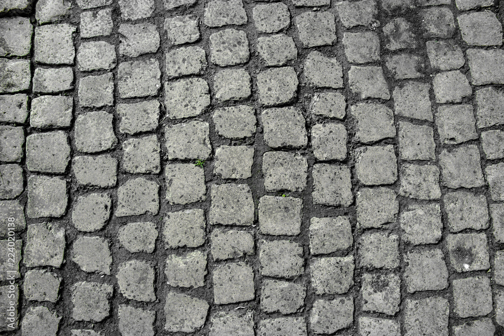 Road of blocks of stone of square shape