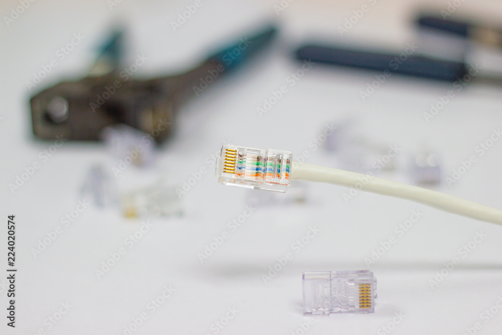 RJ45 connector on a CAT5 Ethernet network Patch Cable, concept internet network cabling