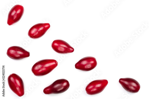 Red berries of cornel or dogwood isolated on white background with copy space for your text. Top view. Flat lay