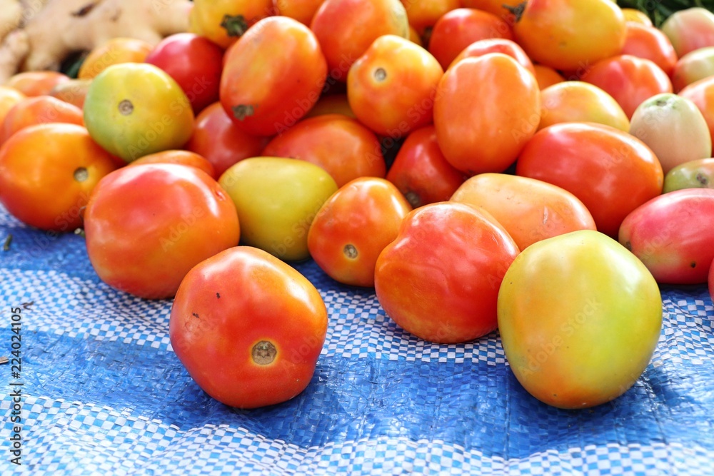 Fresh tomatoes in market Fresh tomatoes in market