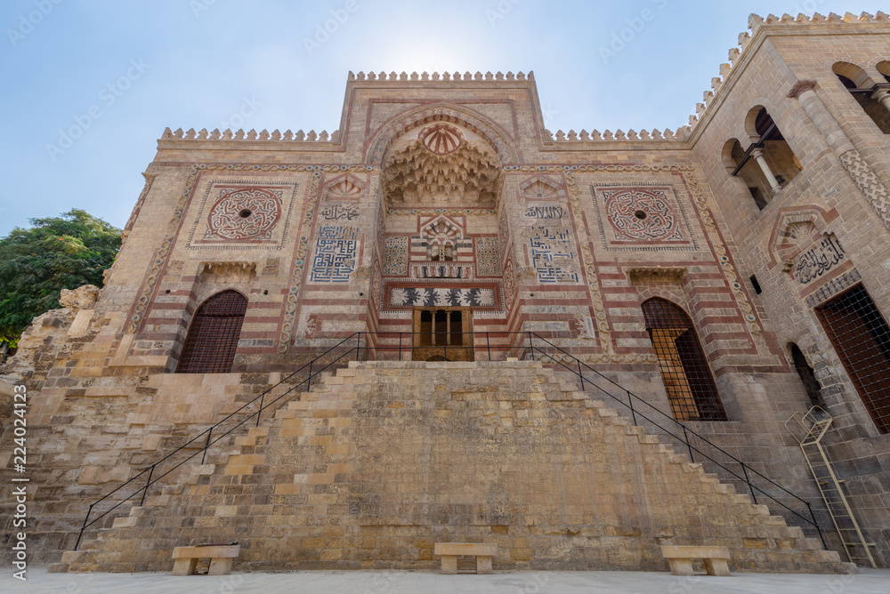 Exterior facade of public Mosque attached to Al-Muayyad Bimaristan historic building, Darb Al Labana district, Old Cairo, Egypt