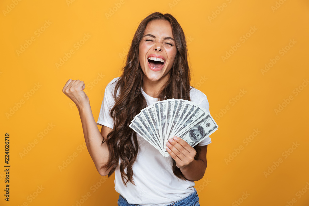 Portrait of a happy young girl with long brunette hair Portrait of a happy young girl with long brunette hair