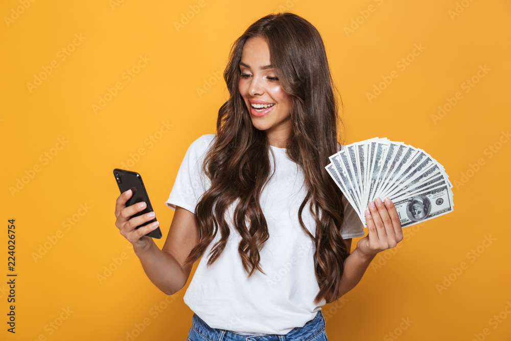 Φωτογραφία Portrait of a happy young girl with long brunette hair