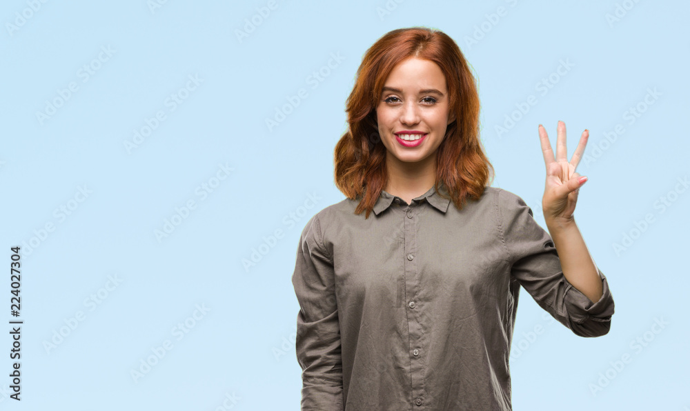 Young beautiful woman over isolated background showing and pointing up with fingers number three while smiling confident and happy. Young beautiful woman over isolated background showing and pointing up with fingers number three while smiling confident and happy.