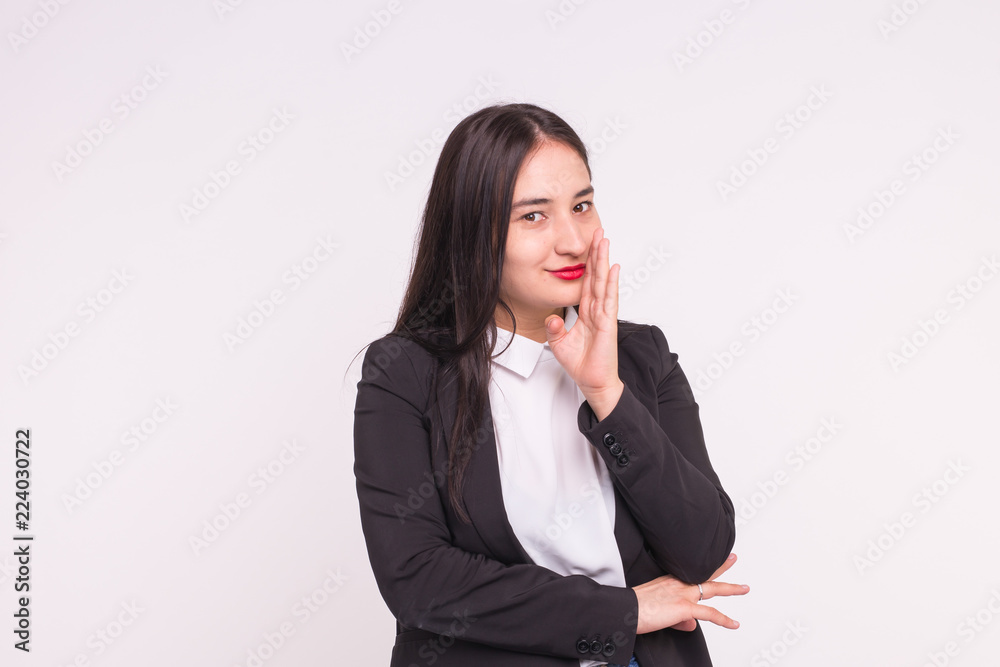 Expressions and people concept - Portrait of beautiful young asian woman with red lips dressed in black jacket smiling and thinking over white background with copy space Expressions and people concept - Portrait of beautiful young asian woman with red lips dressed in black jacket smiling and thinking over white background with copy space