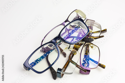 used eyeglasses on a heap
