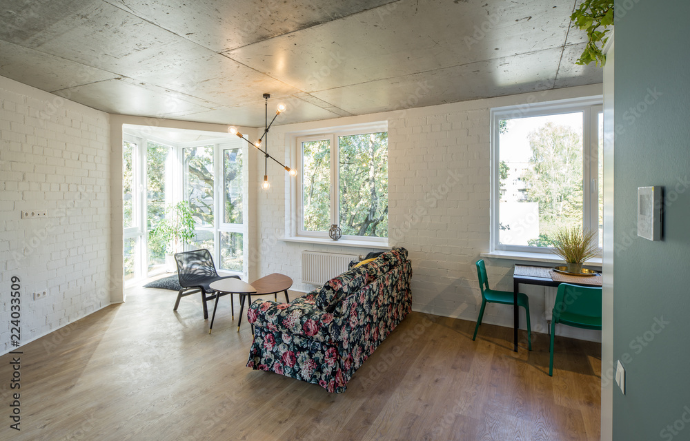 Fototapeta premium Rest zone in a modern apartment. Reading area in studio apartments. 