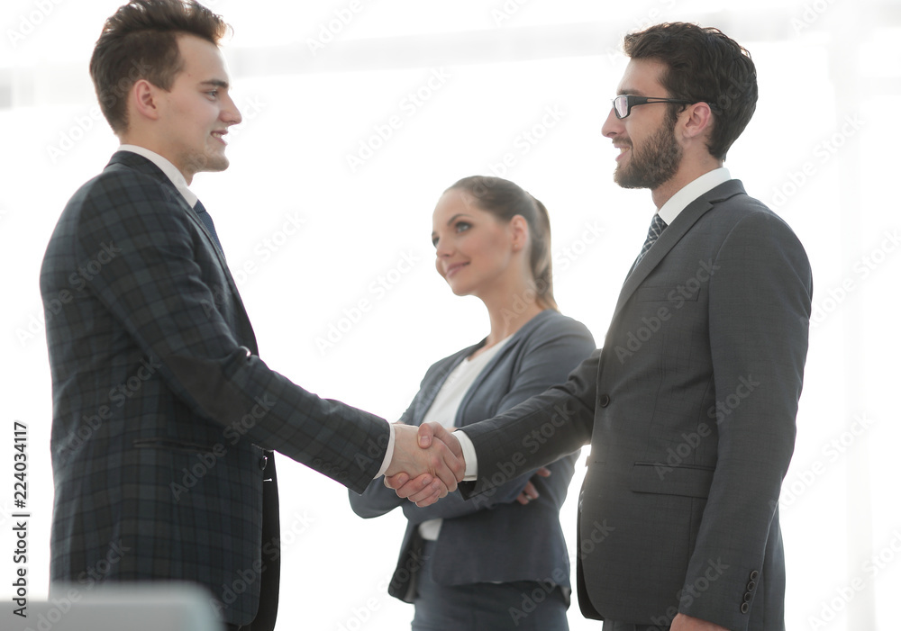 reliable handshake of business people reliable handshake of business people