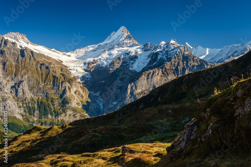 Sun is setting during the famous hiking trail from First to Grindelwald (Bernese Alps, Switzerland). You can have great views on Eiger, Monch and Jungfrau and the Bachalpsee along the way. © Chris