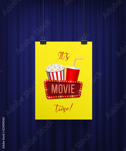 It's movie time vector banner template. Poster with pop corn basket, cola cup and movie sign hanging on paper clips on blue curtain background.