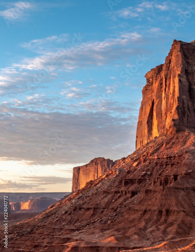 Dramatic buttes in Monument Valley on the Arizona - Utah border  on the Navajo Nation reservation  with dramatic skies and clouds