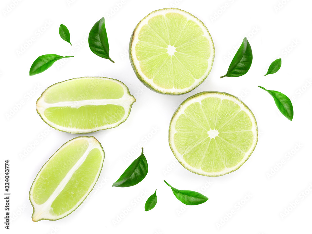 sliced lime with leaves isolated on white background. Top view. Flat lay pattern